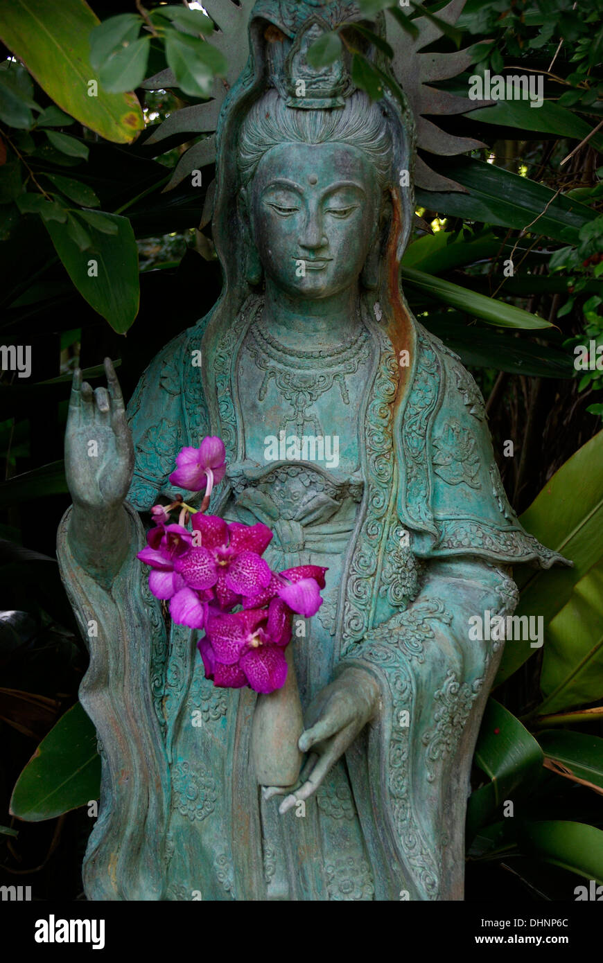 Buddha with Orchids Stock Photo
