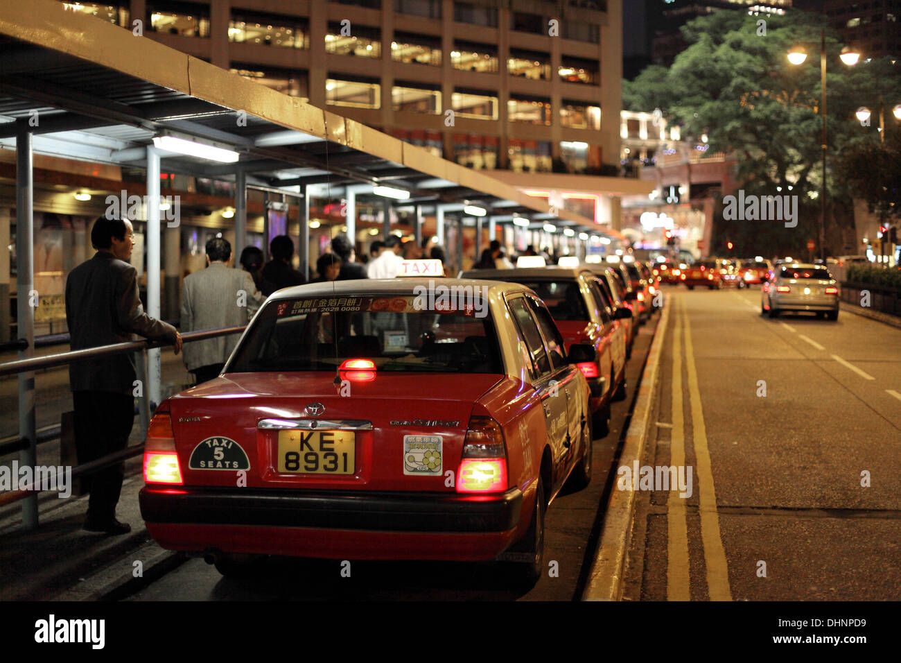 Taxi rank in Hong Kong at night Stock Photo