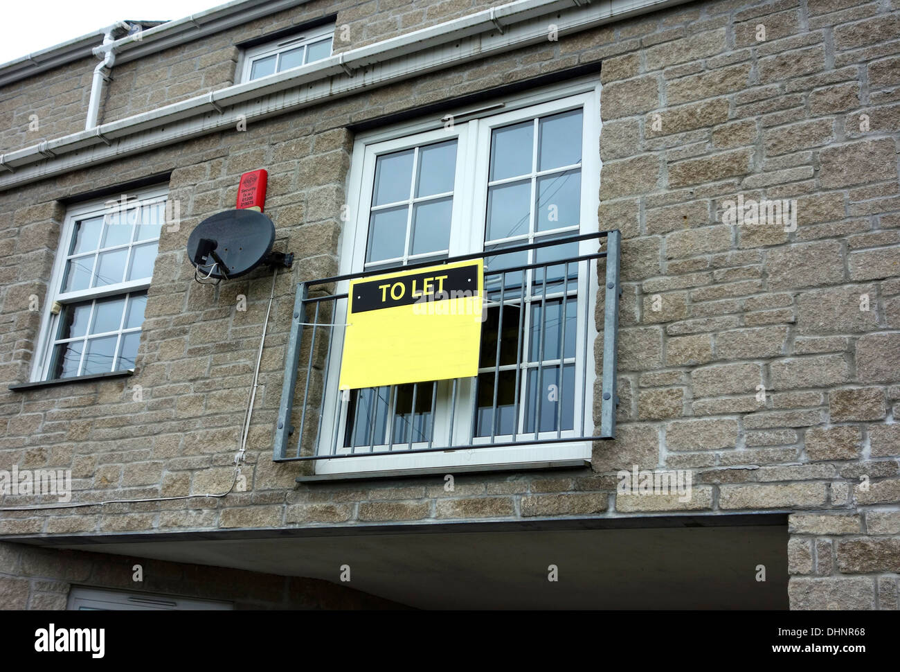 A ' To Let ' sign on a house Stock Photo