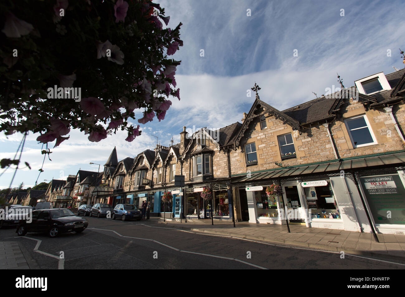 Town of Pitlochry, Scotland. Picturesque view of the cast iron canopy covered shops in Pitlochry’s town centre, on Atholl Road. Stock Photo