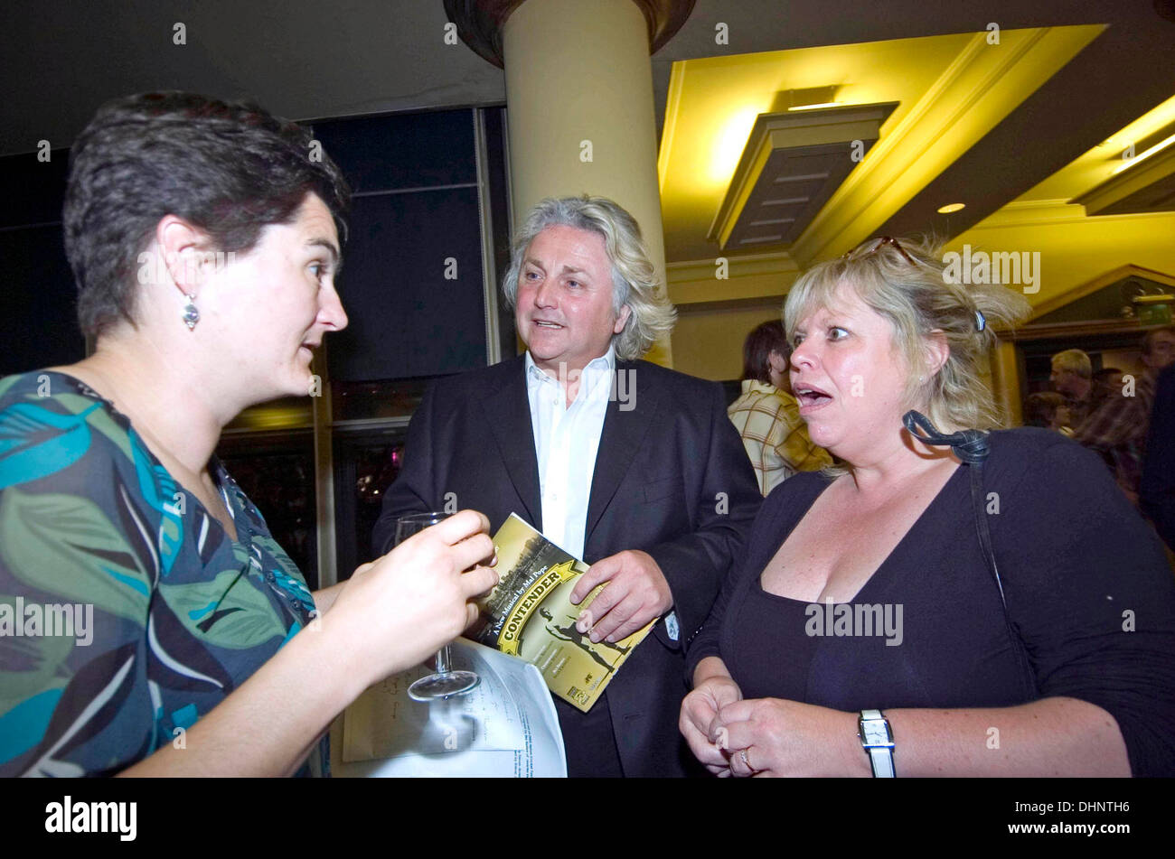 Fashion designer David Emanuel chatting to guests at an aftershow party at the Grand Theatre in Swansea. Stock Photo