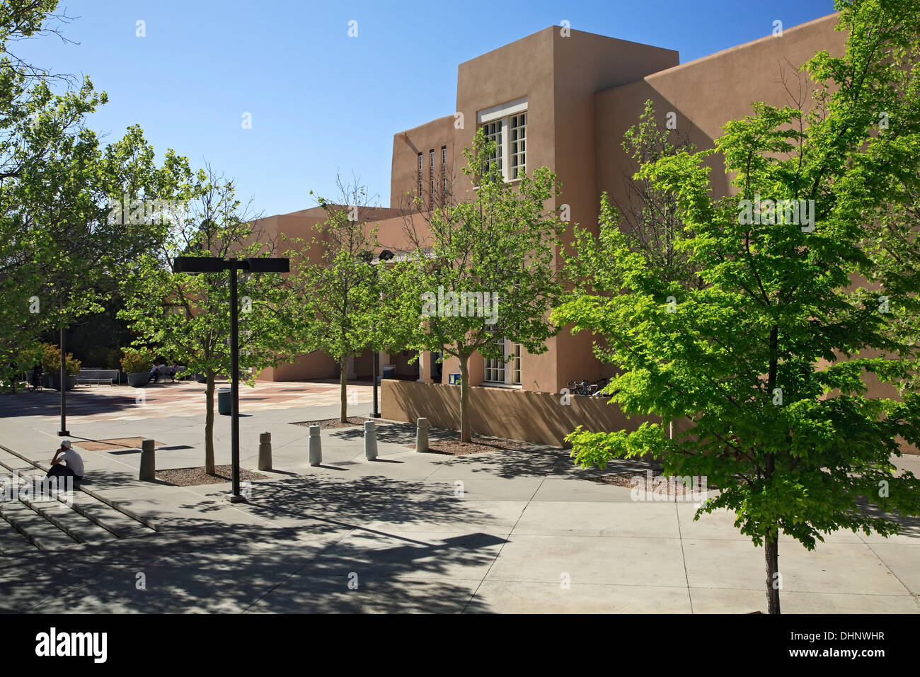 Main entrance and student on cell phone, Zimmerman Library, University of New Mexico Campus, Albuquerque, New Mexico USA Stock Photo