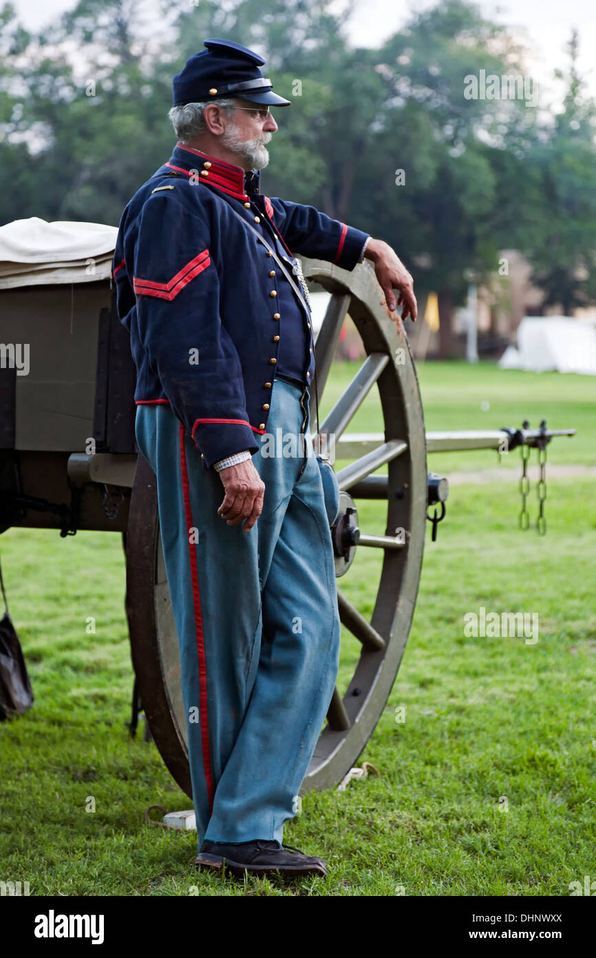 Civil War Era Union soldier reenactor and cannon, Fort Stanton Live!, Fort Stanton, New Mexico USA Stock Photo