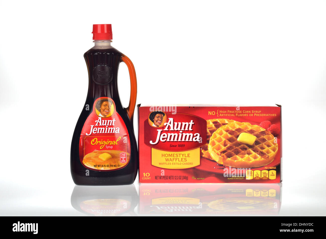 Unopened box of Aunt Jemima frozen waffles and bottle of Aunt Jemima of original syrup on white background, cutout. USA Stock Photo
