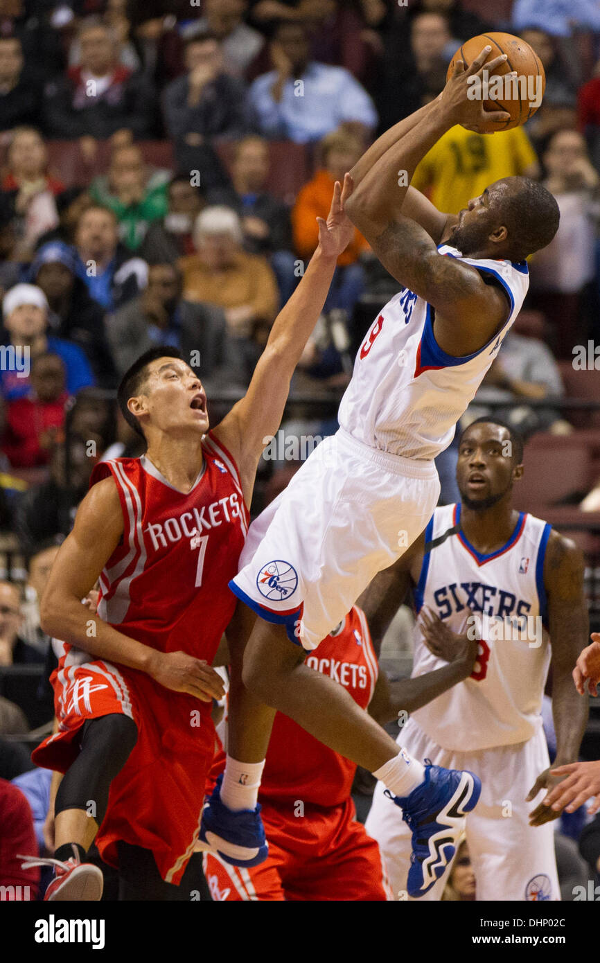 November 13, 2013: Philadelphia 76ers shooting guard James Anderson (9) goes up for the shot with Houston Rockets point guard Jeremy Lin (7) tries to defend him during the NBA game between the Houston Rockets and the Philadelphia 76ers at the Wells Fargo Center in Philadelphia, Pennsylvania. The 76ers win 123-117 in overtime. (Christopher Szagola/Cal Sport Media) Stock Photo
