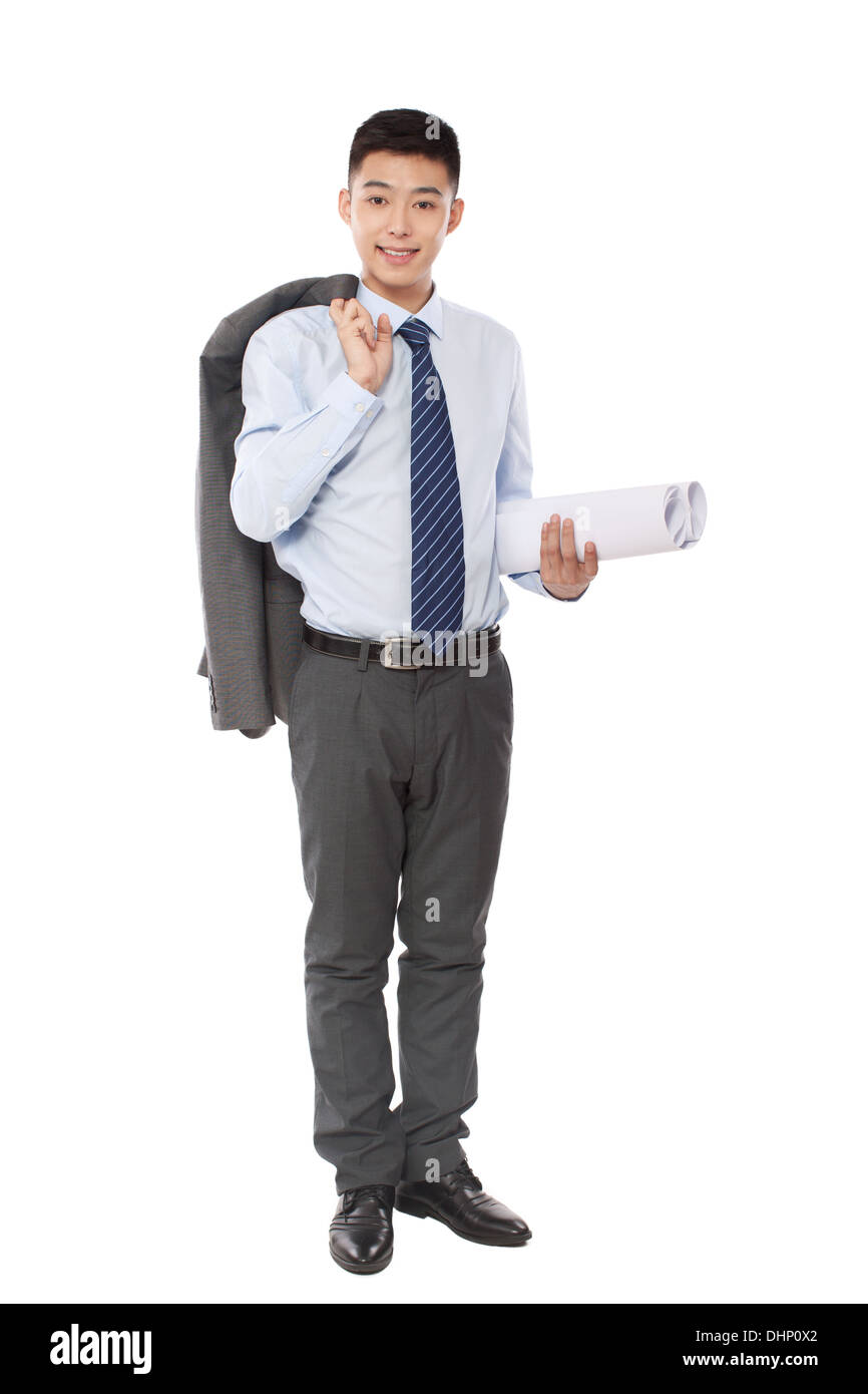 Young engineer holding blueprints Stock Photo