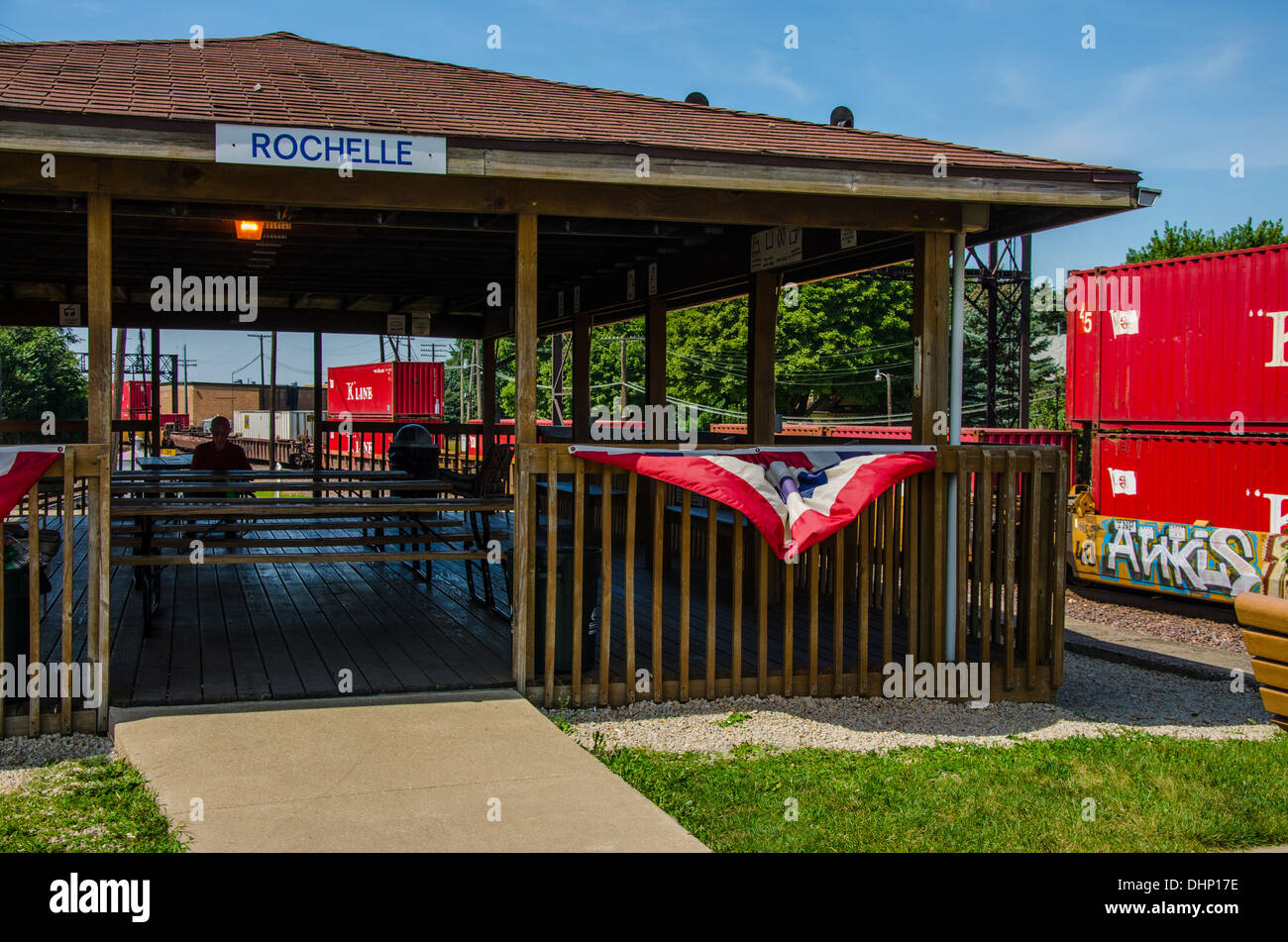 Train watchers at the Rochelle Railroad Park in Rochelle, Illinois, a town along the Lincoln Highway, Stock Photo