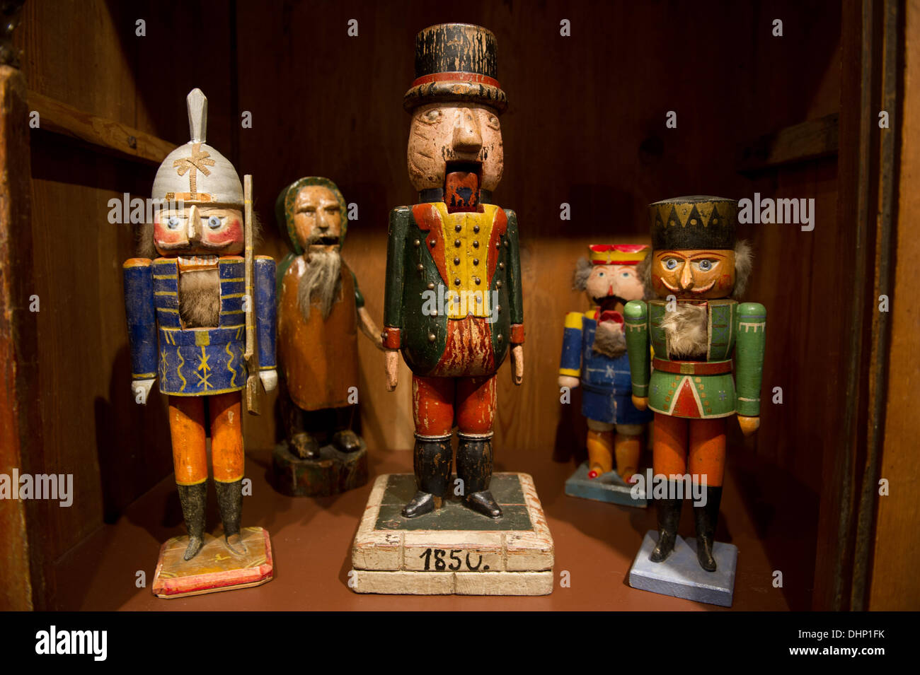 Stralsund, Germany. 12th Nov, 2013. Wooden nutcracker from the Erz Mountains stand in the special exhibition of nutcrackers of collector Adolf Heidenreich in Stralsund, Germany, 12 November 2013. From 15 November 2013, the Kulturhistorisches Museum of Stralsund exhibits the most beautiful pieces of his collection of about 150 nutcrackers. Photo: Stefan Sauer/dpa/Alamy Live News Stock Photo