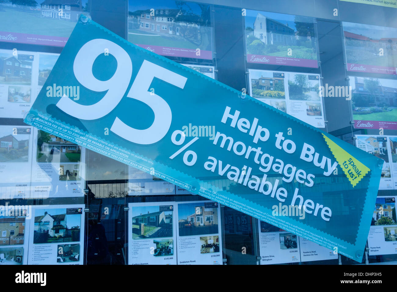 Help to Buy sign in Estate Agent window. England, UK Stock Photo