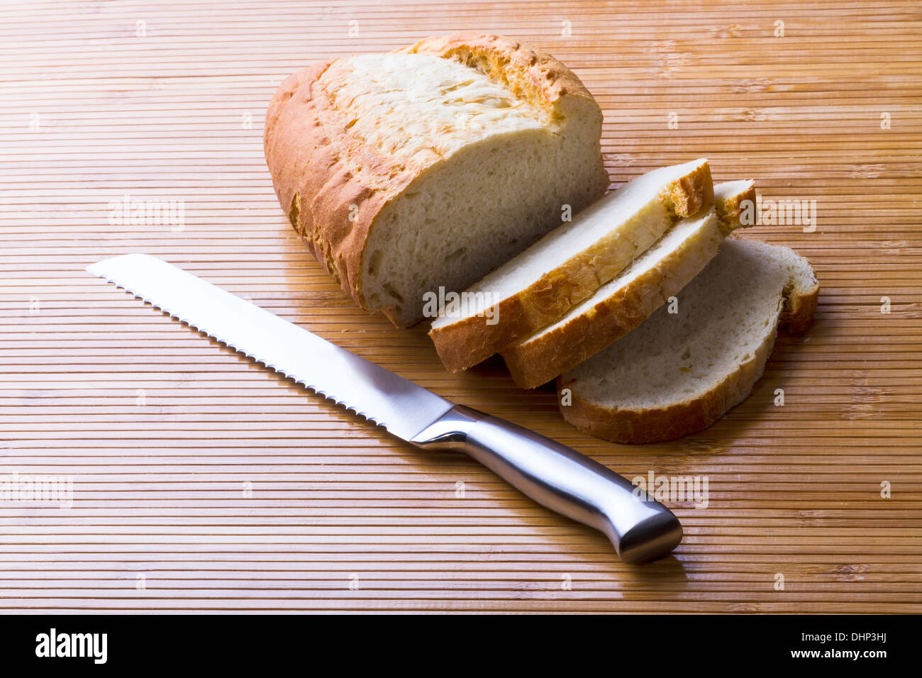 The bread cut by slices and knife for bread Stock Photo