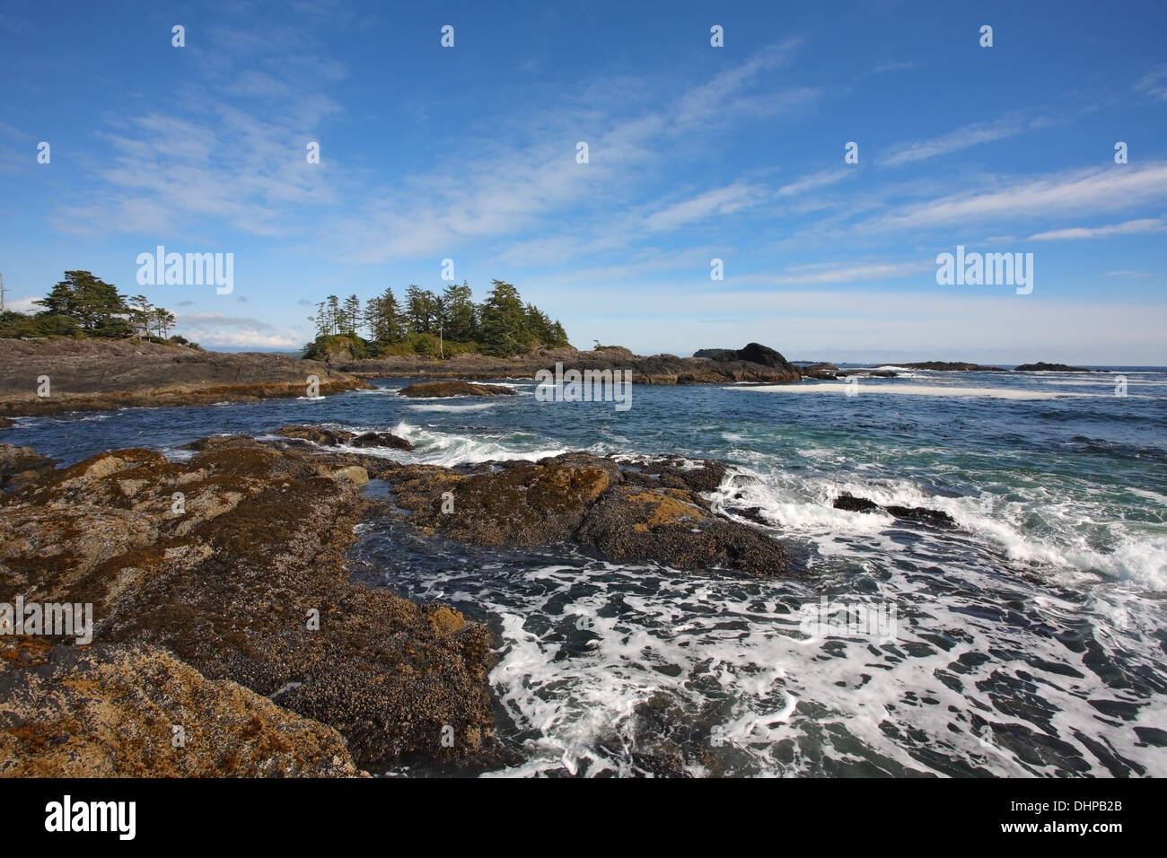 . On the Pacific beach begins tide Stock Photo Alamy