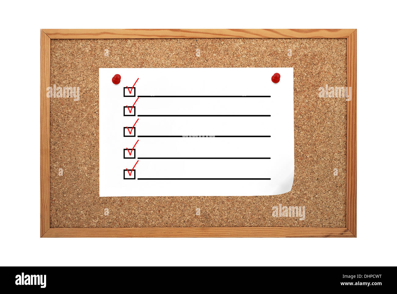 paper with check boxes cliped to cork board Stock Photo