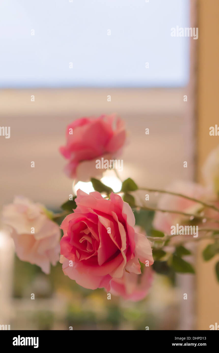 Bouquet of plastic roses and in ceramic vase Stock Photo - Alamy