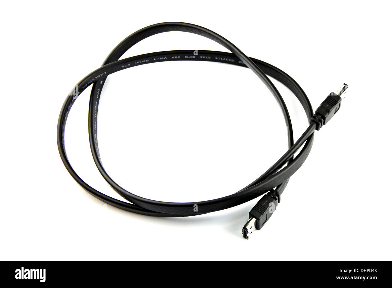 Black cable SATA used to connect the computer on white background. Stock Photo
