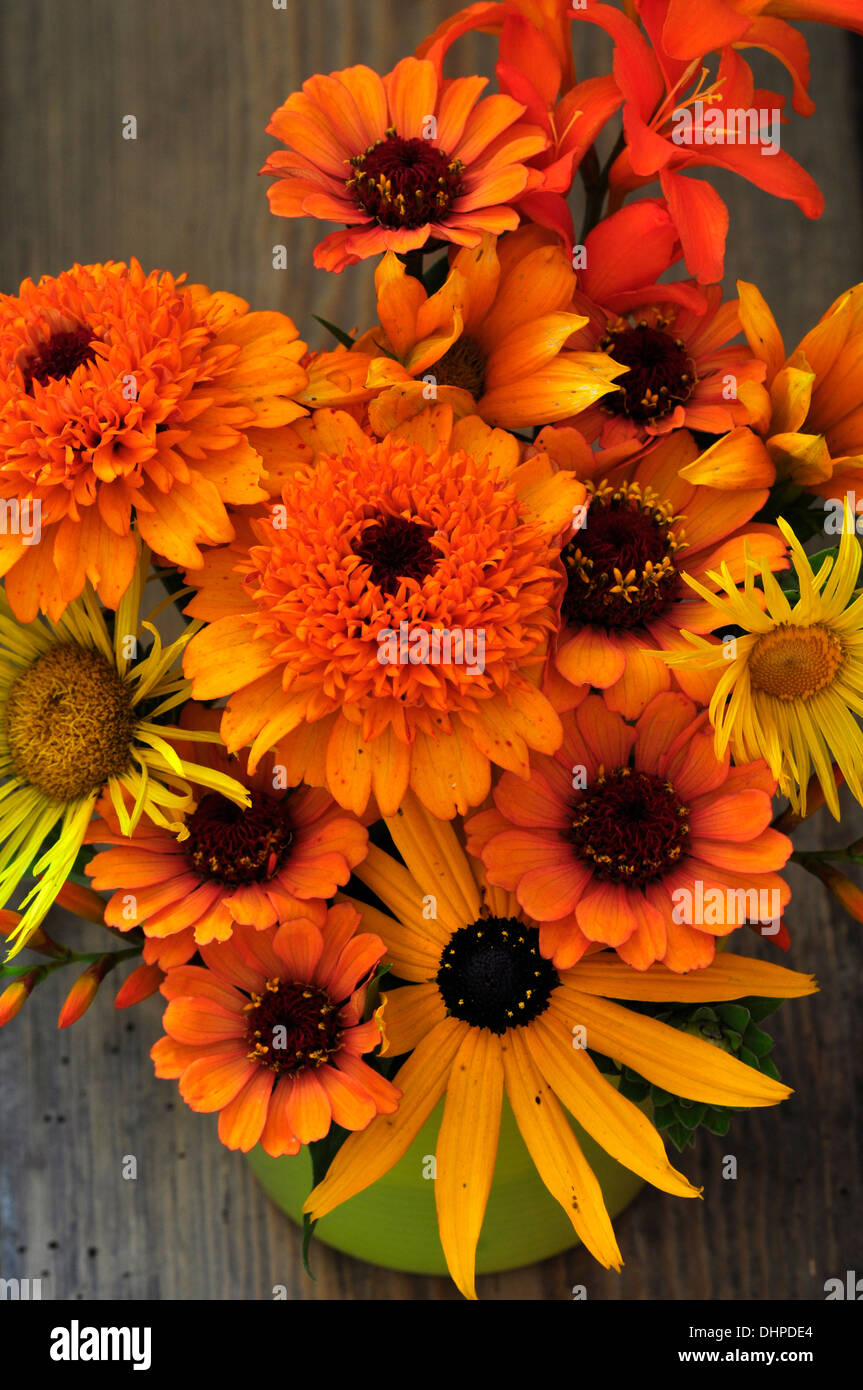 An orange cut flower arrangement UK Stock Photo Alamy