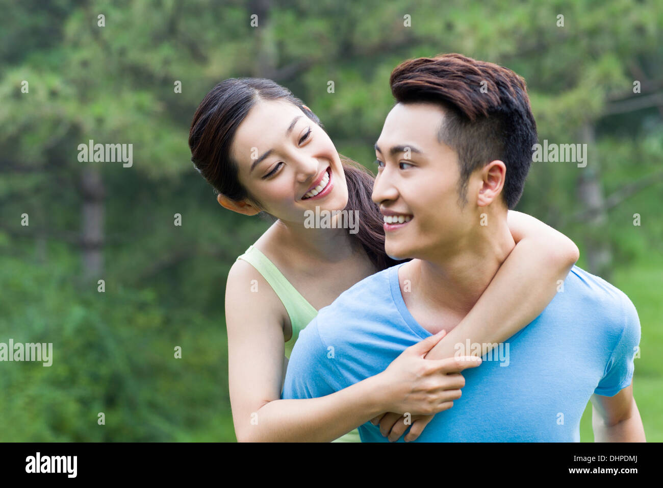 Young man giving girlfriend piggy hi-res stock photography and images ...