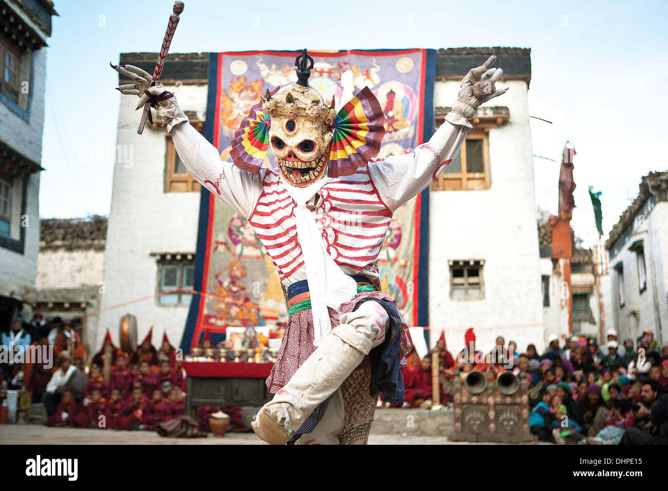 Lo Monthang, Upper Mustang, Nepal. 30th May, 2011. During the three-day spectacle of the Tiji Festival in Upper Mustang, Nepal, monks dress as different animals, demons and divinities to enact an epic fight between good and evil. In the town square of Lo Manthang, a monk dressed as a skeleton performs an ancient dance accompanied by ceremonial Tibetan Buddhist music. © Taylor Weidman/ZUMA Wire/ZUMAPRESS.com/Alamy Live News Stock Photo