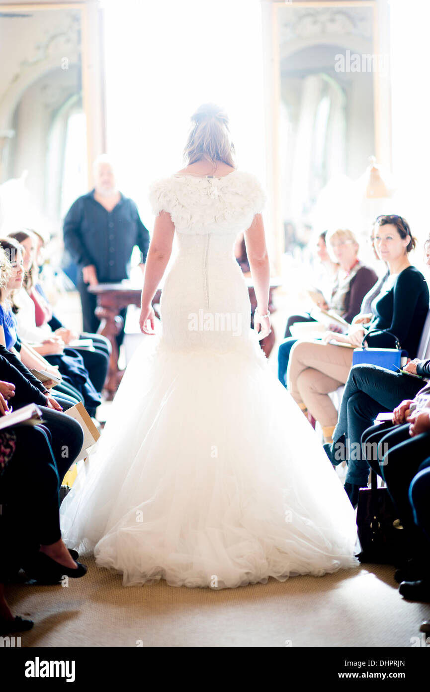 A woman modeling bridal dresses at a Wedding Fayre Fair, Nanteos Mansion,, Aberystwyth Wales UK Stock Photo