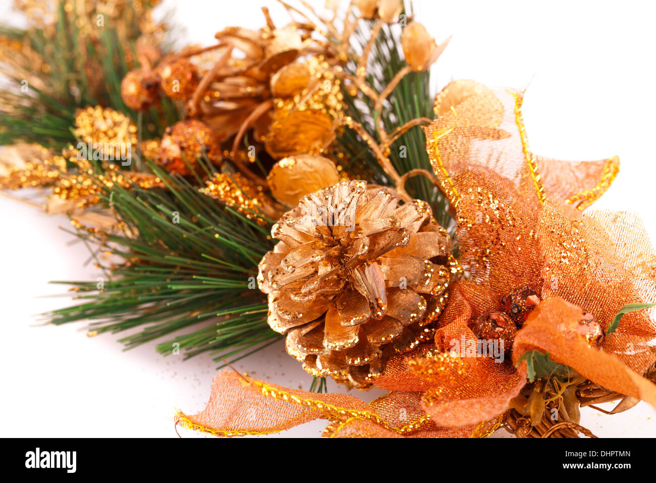 Christmas tree branch with cones on white background Stock Photo - Alamy