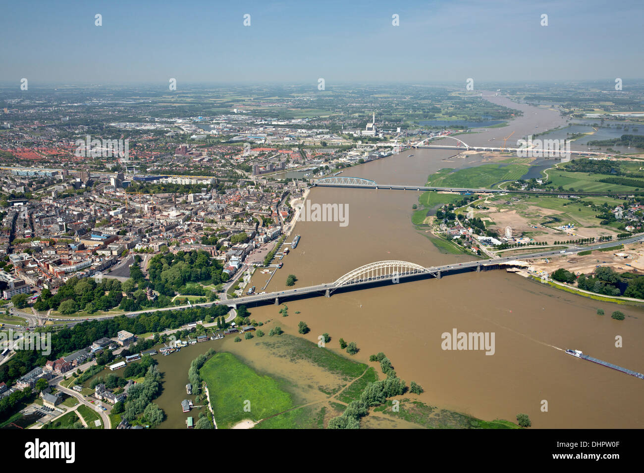 Netherlands, Nijmegen. View on city and Waal river. Ships. Aerial Stock Photo