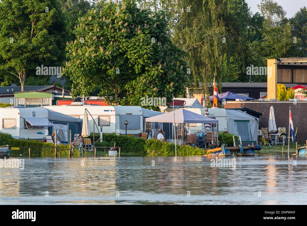 Netherlands, Olst, IJssel river. Camping site, situated in the flood plains and threatened by high water Stock Photo