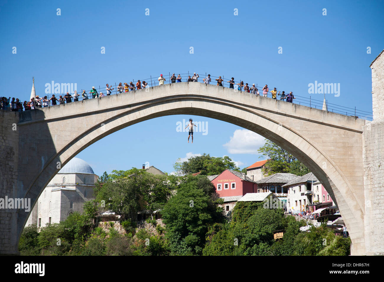 boy who dives from the old bridge, mostar, bosnia and herzegovina, europe Stock Photo