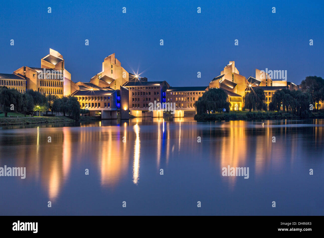 Netherlands, Maastricht, Maas or Meuse river. Provincial government building called Gouvernement. Twilight Stock Photo
