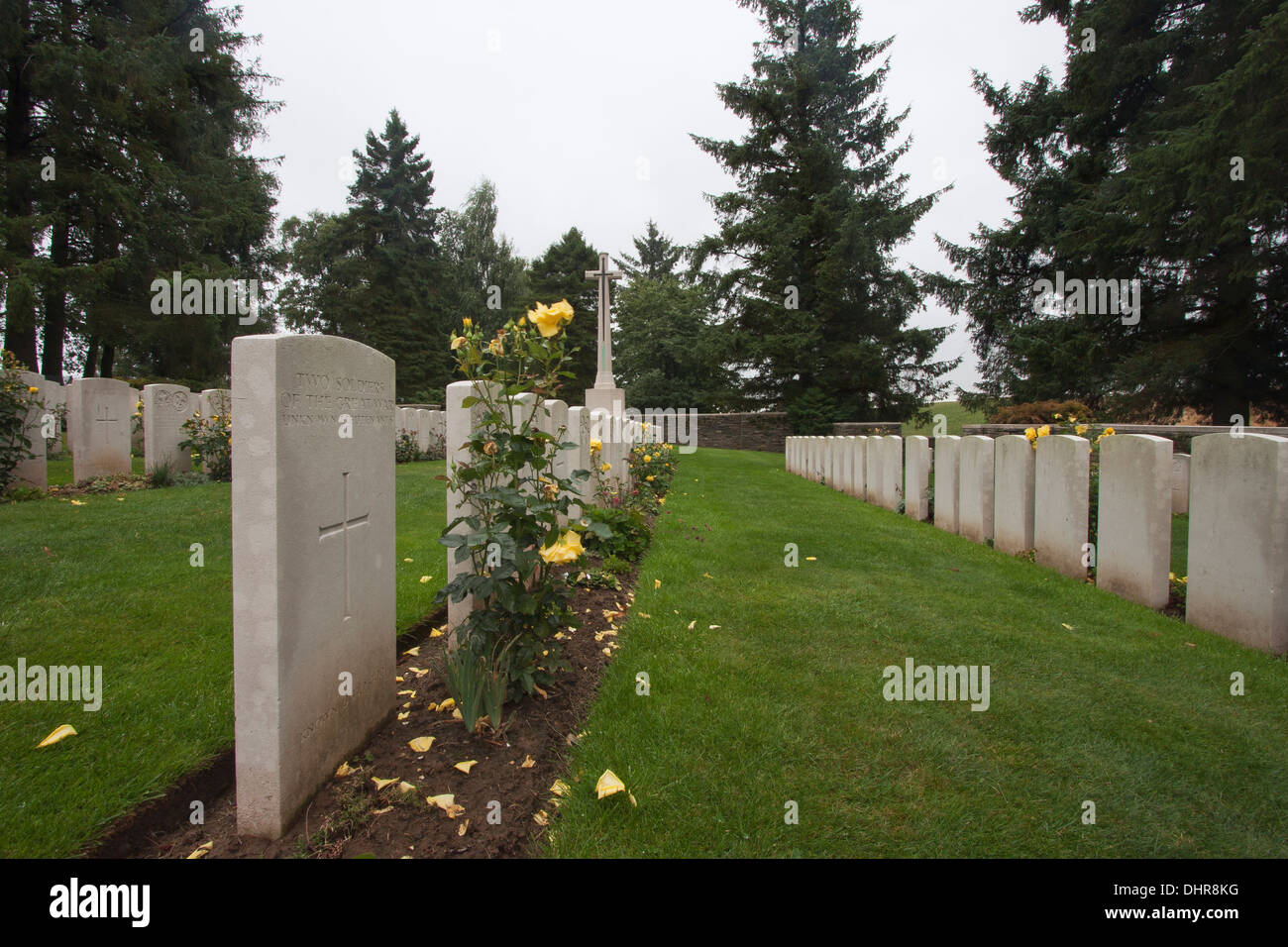 Graves with roses at the end of the site Stock Photo