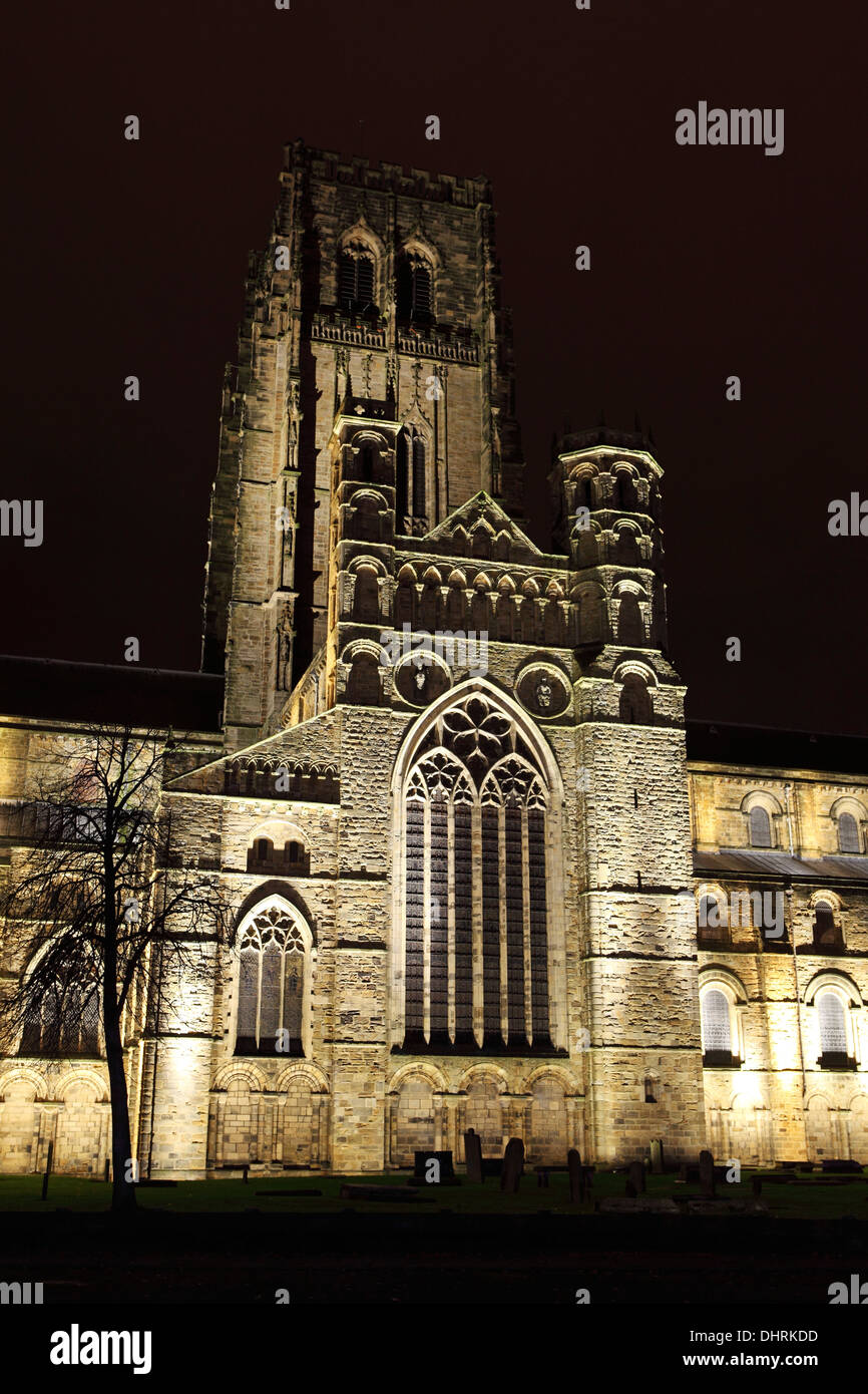 Lights illuminate Durham Cathedral at night. The Romanesque cathedral