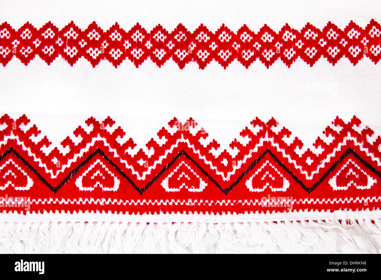 Ukrainian national red ornament embroidery closeup Stock Photo
