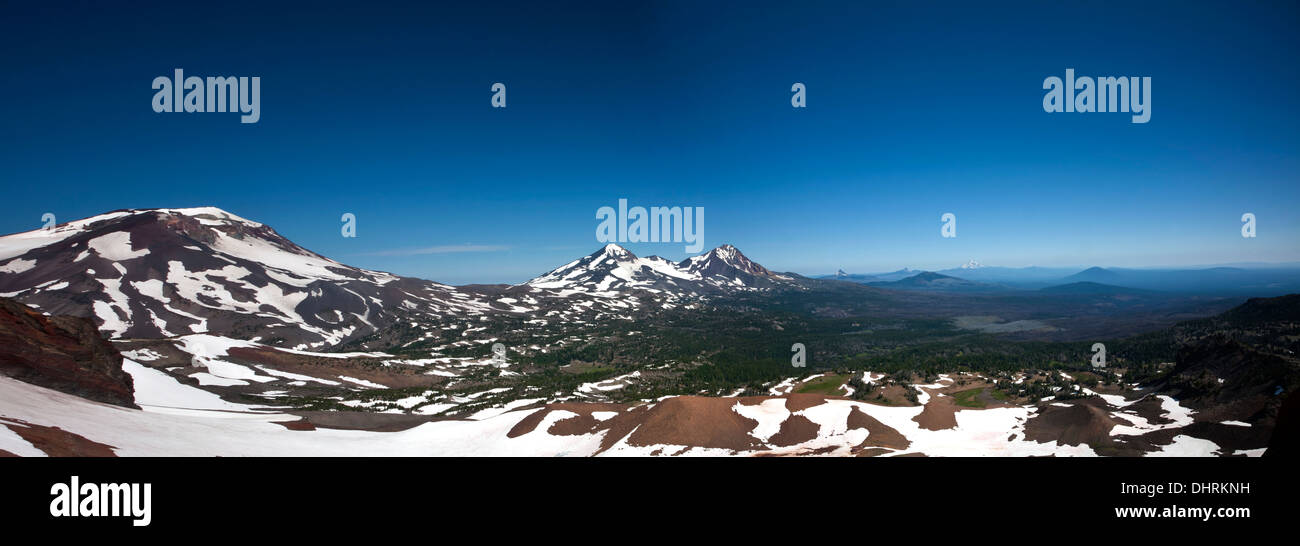 Panoramic view of the Cascade Mountains from the South Sister to Mount Jefferson from Broken Top in the Three Sisters Wilderness Stock Photo