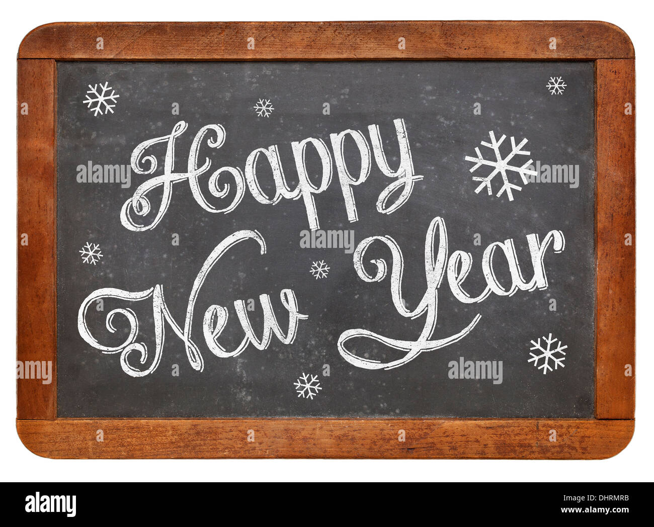 Happy New Year - white chalk text on a vintage slate blackboard Stock Photo