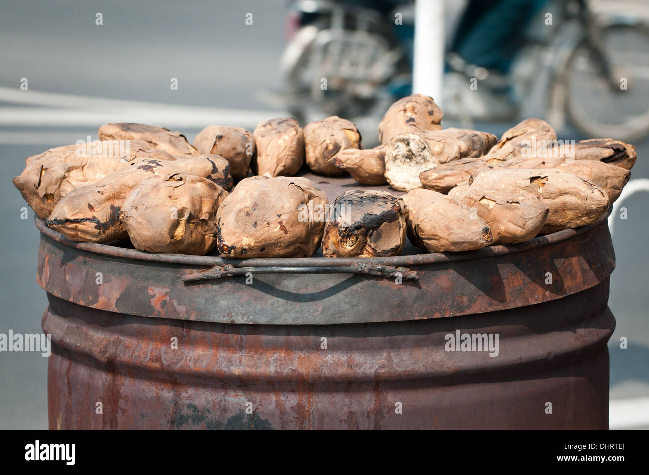 Roasted sweet potatoes - popular street food in Beijing, China Stock Photo