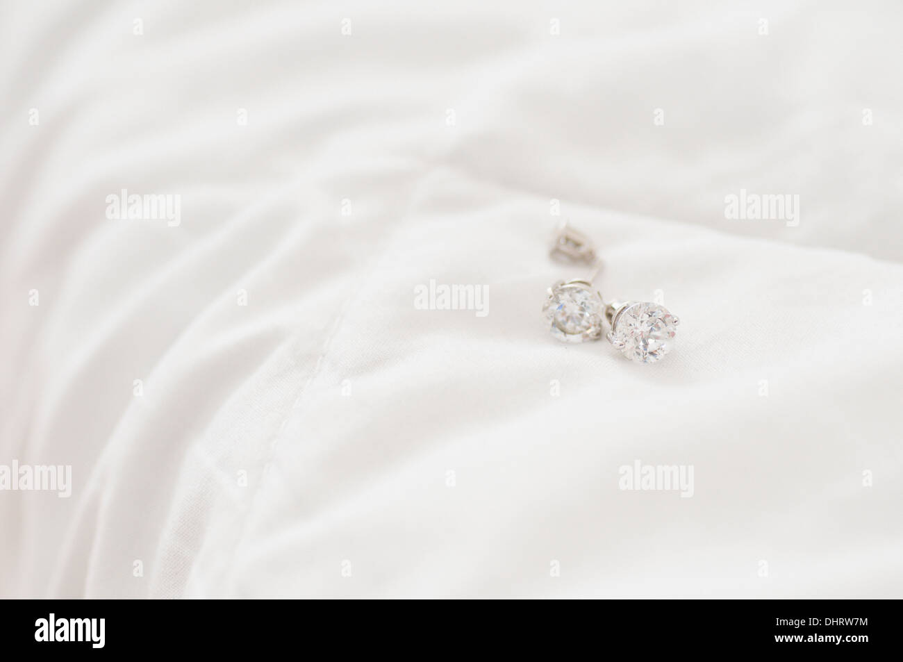 Woman with earrings hi-res stock photography and images - Alamy