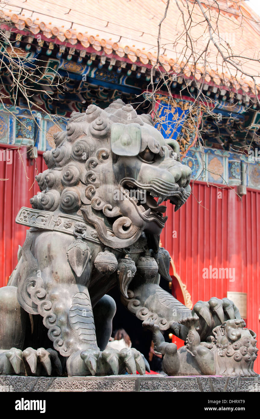 Lion statue in Yonghe Temple also known as Yonghe Lamasery or simply Lama Temple in Beijing, China Stock Photo