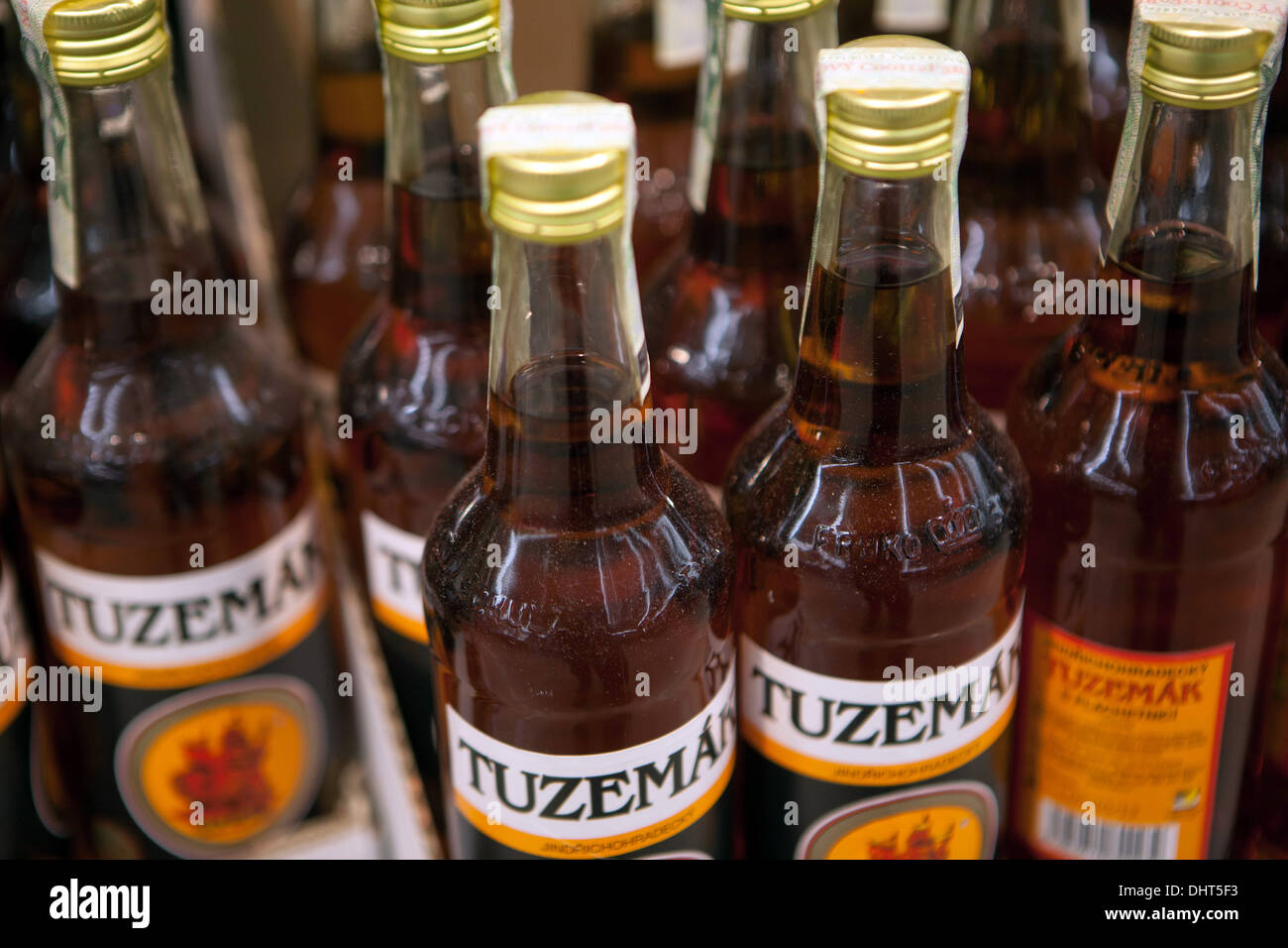 Tuzemak is Czech-distilled alcoholic liqueur supermarket shelf, bottles Stock Photo