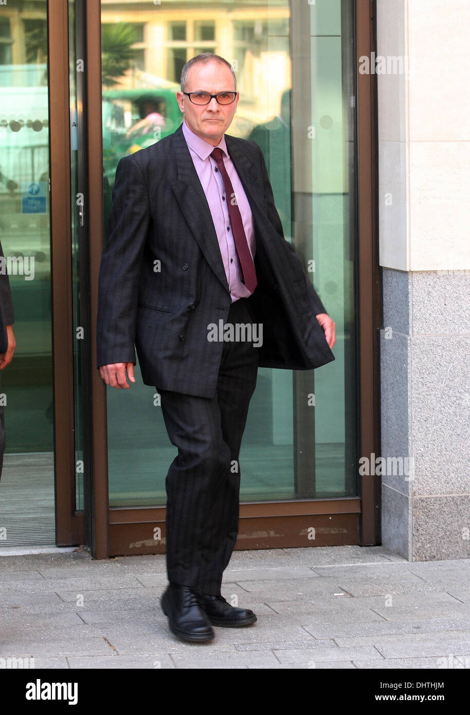 PC Alex MacFarlane leaves Westminster Magistrates' Court in London, England on 22 May, 2012. MacFarlane was charged with racially abusing a suspect after the 2011 summer riots in London, a charge which he denied in court as he entered a not guilty plea. He was released on bail and is due appear at Southwark Crown Court on 29 June for a hearing  London, England - 22.05.12 Mandatory  Stock Photo