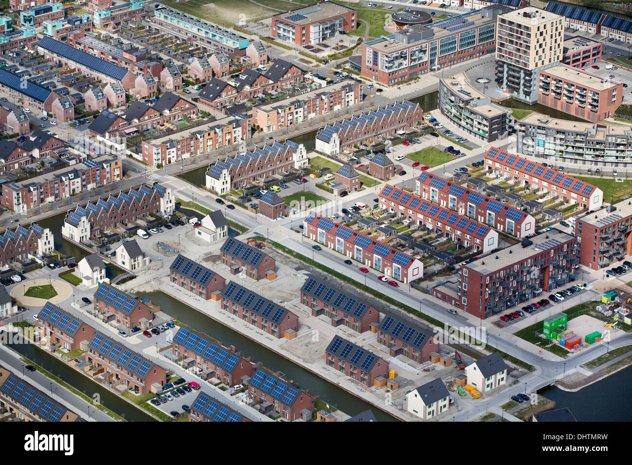 Netherlands, Heerhugowaard, District called City of the Sun, Dutch: Stad van de Zon. All houses with solar panels. Aerial Stock Photo