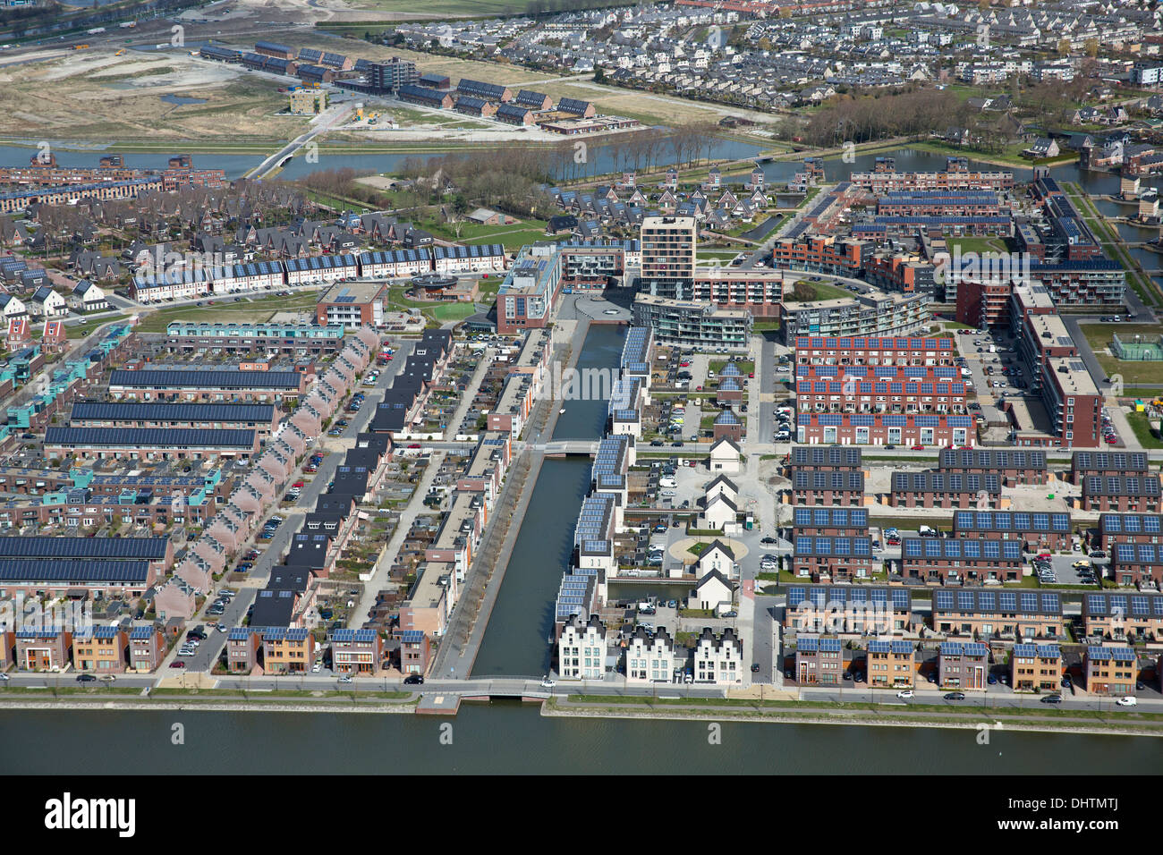 Netherlands, Heerhugowaard, District called City of the Sun, Dutch: Stad van de Zon. All houses with solar panels. Aerial Stock Photo