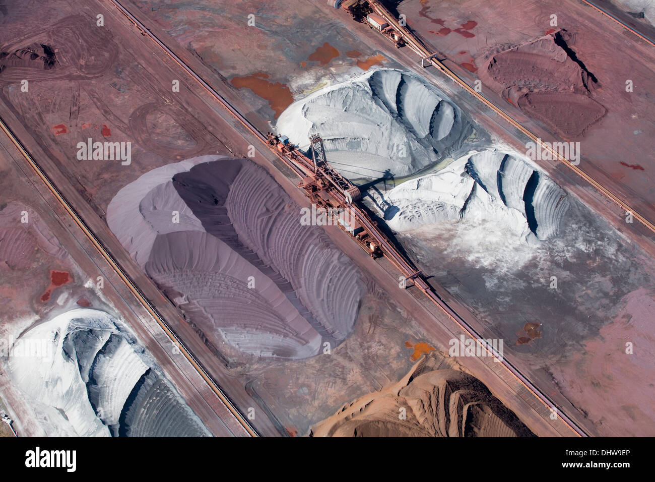 Netherlands, Rotterdam, Port, Harbour, storage of crude ore. Aerial Stock Photo