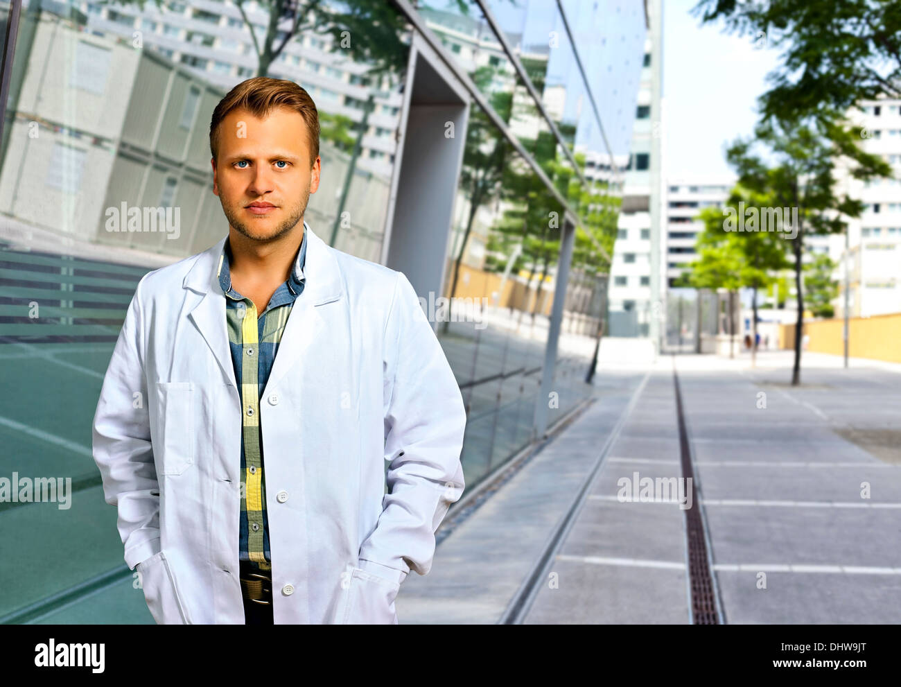 Young Scientist or doctor with confident personality standing in urban area Stock Photo