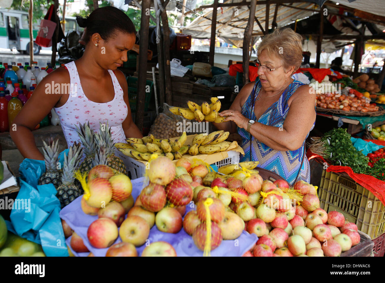 Woman buying fruit on Santo Amaro market Stock Photo