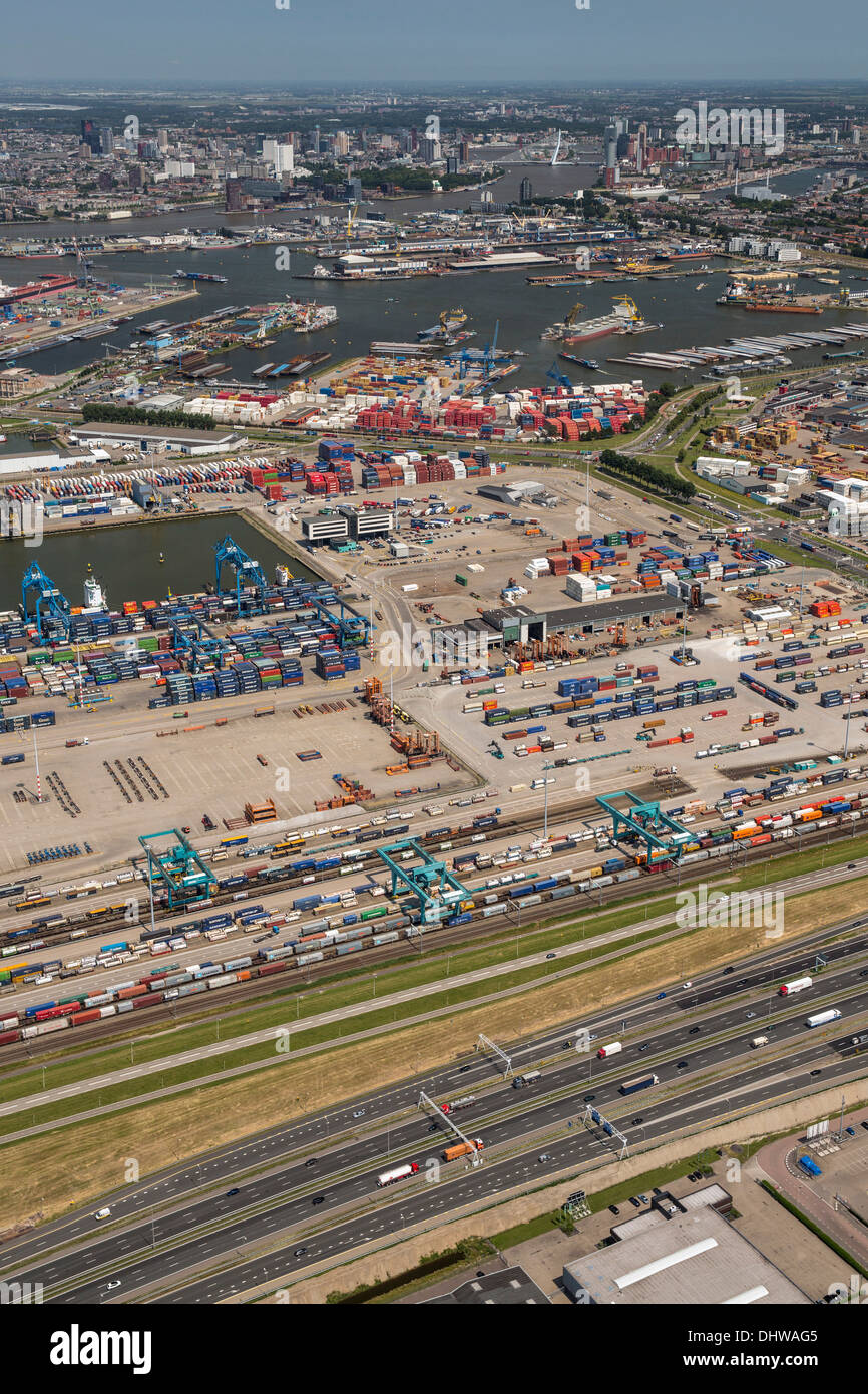 Netherlands, Rotterdam, Port of Rotterdam. Container storage in area called Petroleumhaven. Background city center. Aerial Stock Photo