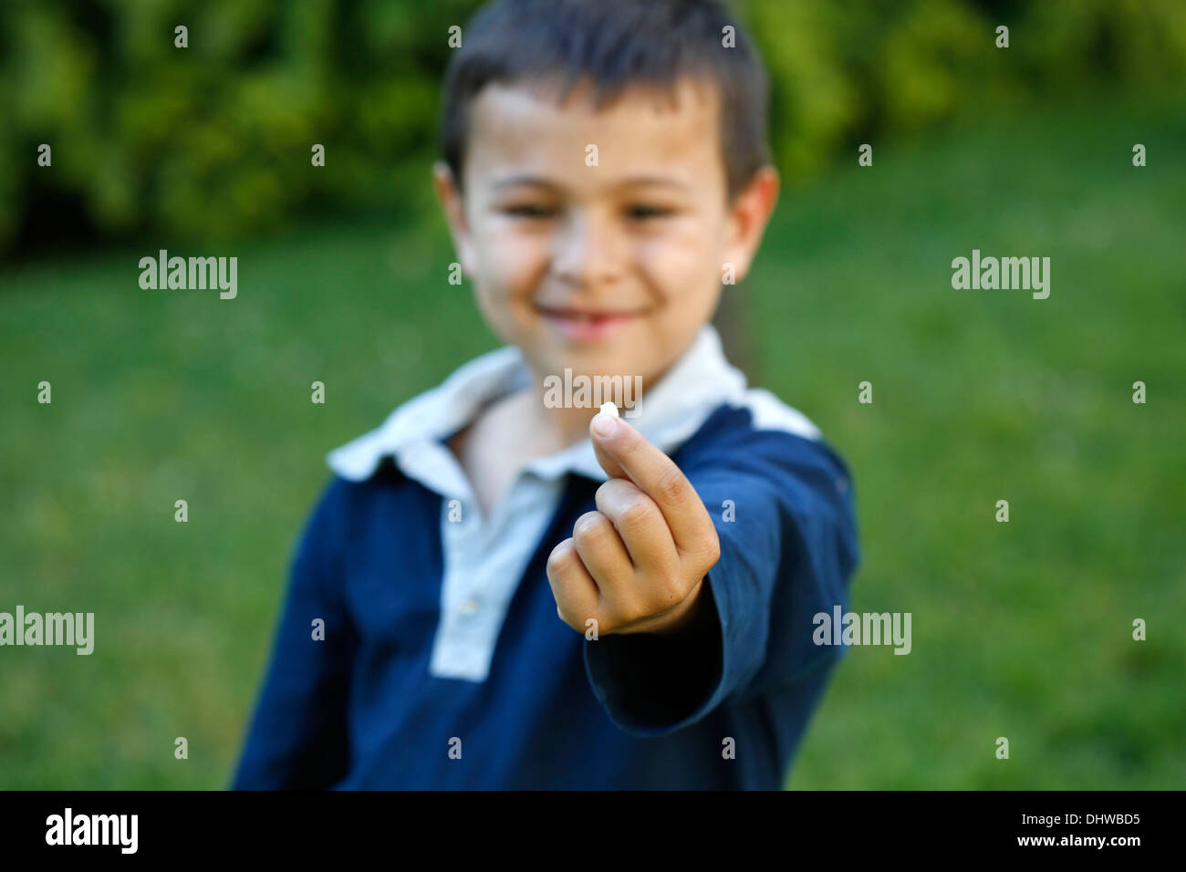 7-year-old boy showing a missing tooth Stock Photo
