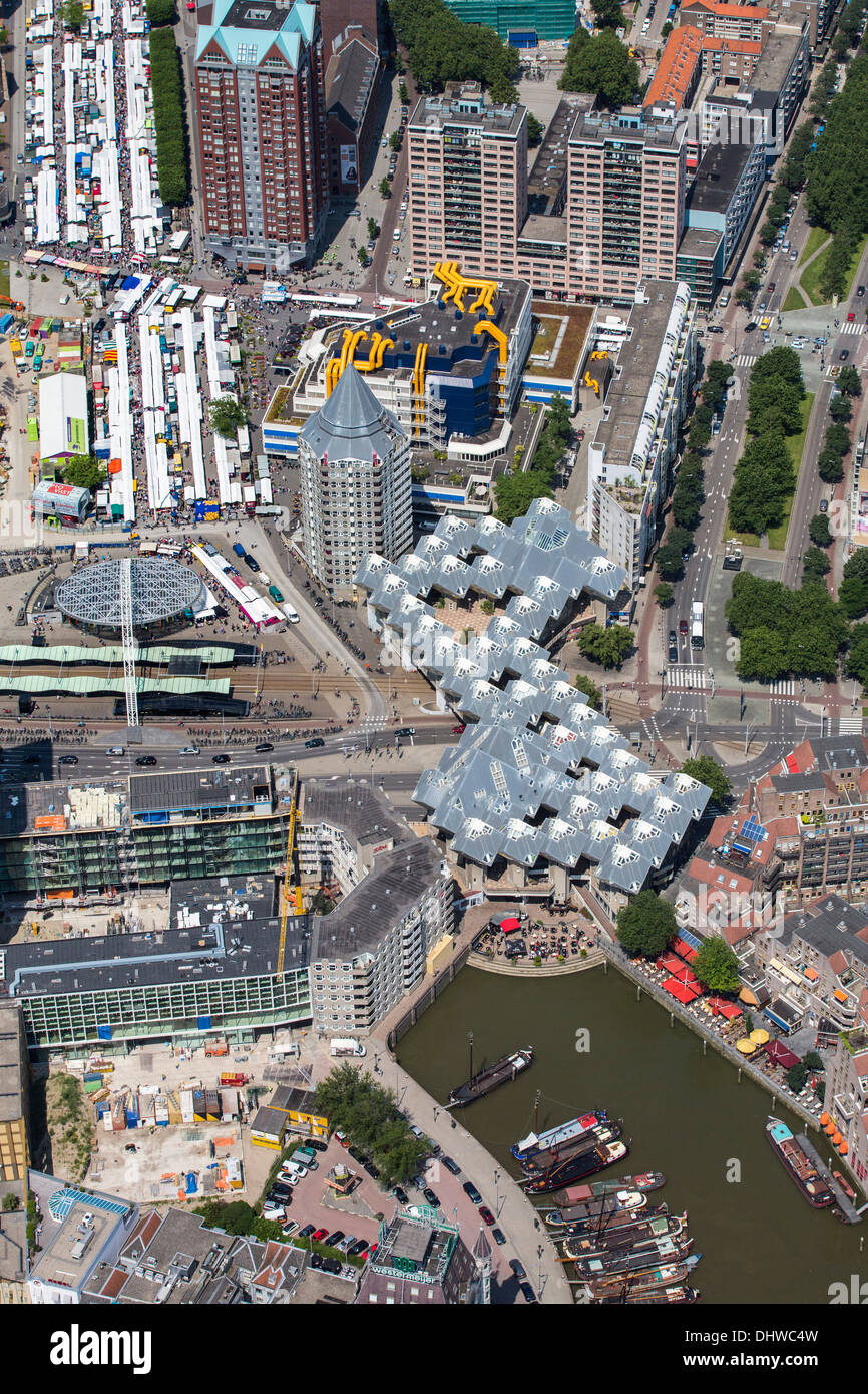 Netherlands, Rotterdam, View on city center with railway station called Blaak and Cube houses, architect Jan Blom. Aerial Stock Photo