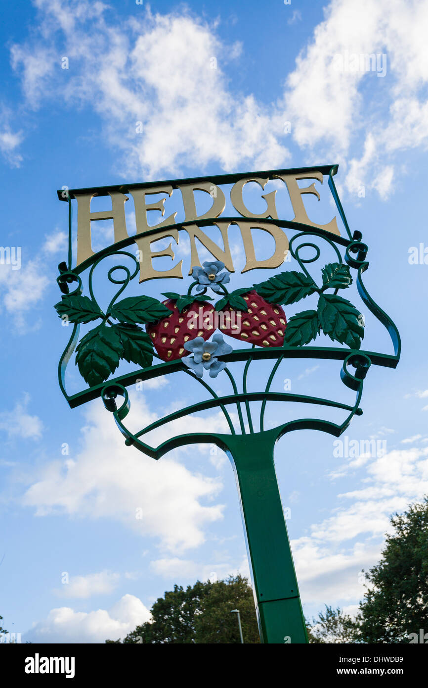 Ornate sign at entrance to Hedge End village near Southampton Stock
