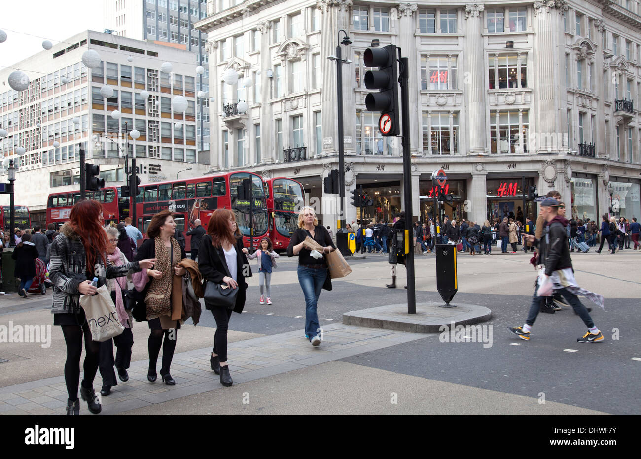 People Crossing at Oxford Circus in Central London UK Stock Photo