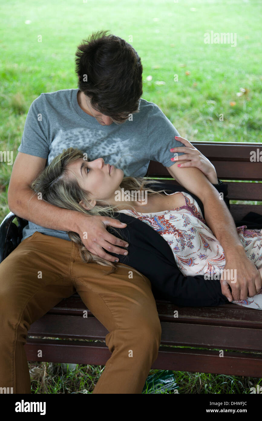 Seated man reclining woman hi-res stock photography and images - Alamy