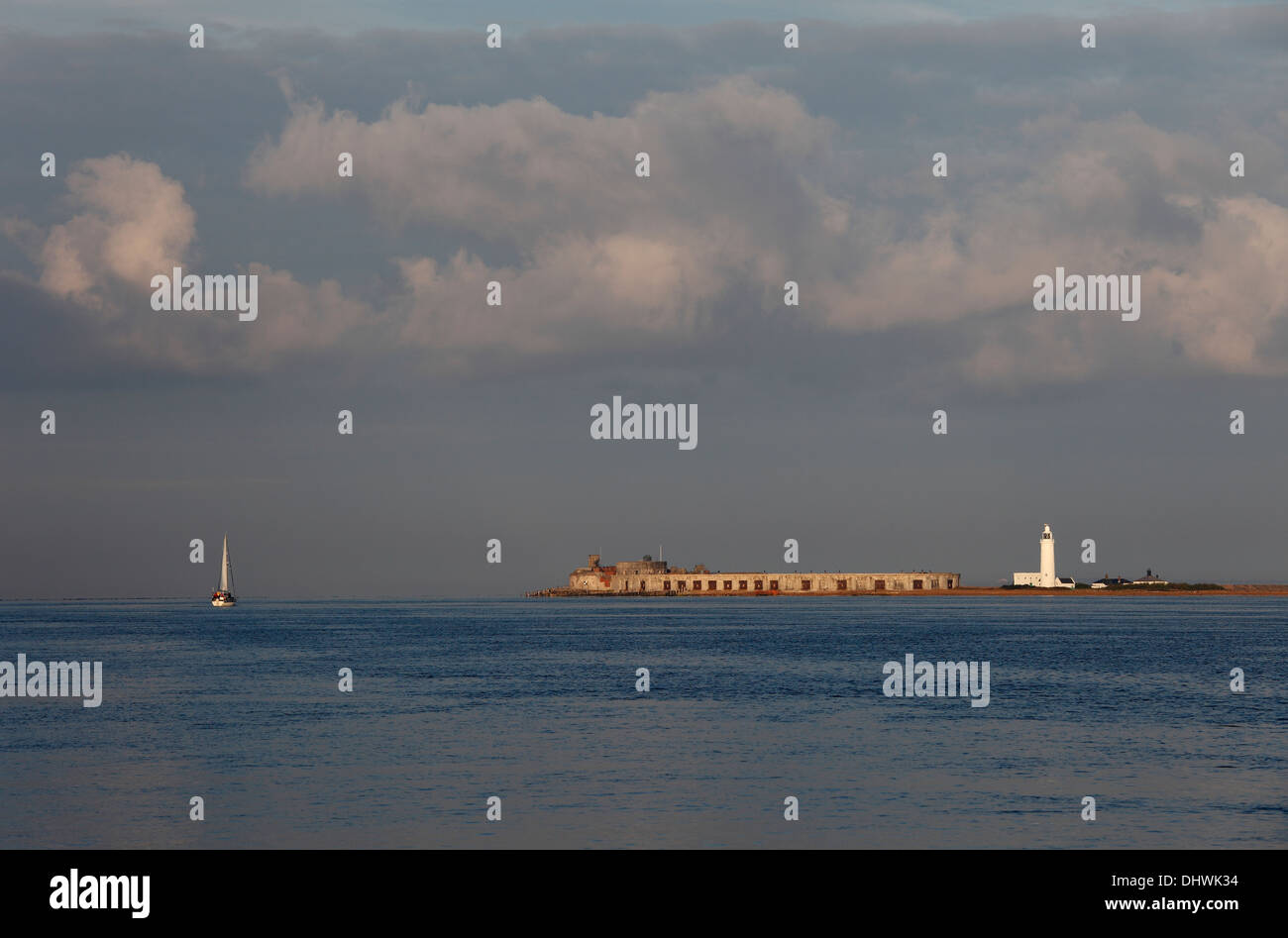 Hurst castle and lighthouse Keyhaven in morning light from Isle of Wight  Hampshire England Stock Photo