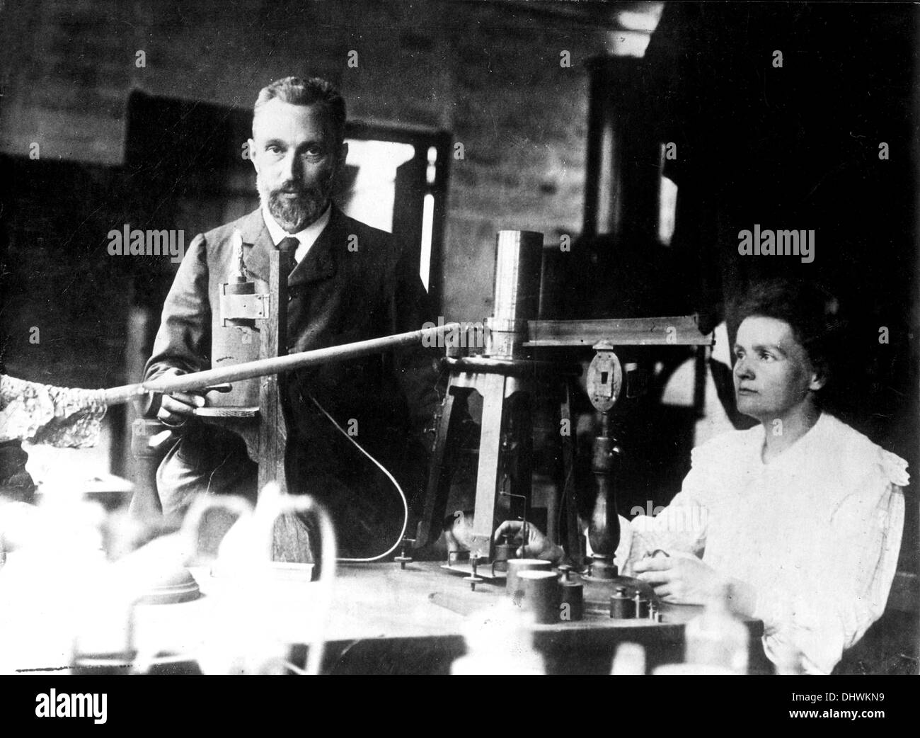 Pierre and Marie Curie in laboratory Stock Photo